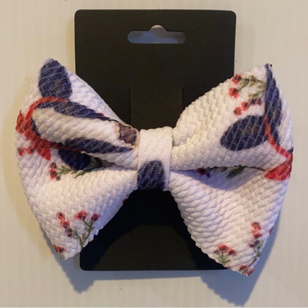 Cow print clip on bow